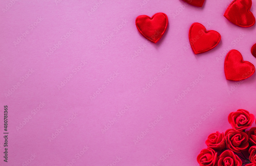 Red love heart on a pink background. Valentines day card concept. Copy space.