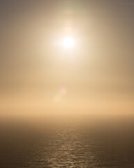 Keuken achterwand Beige Zonsondergang boven kalme zee  © Pooyan Shafiei
