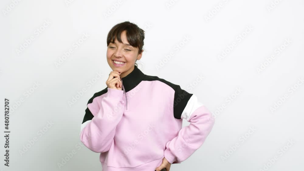 Pretty woman smiling and looking to the front with confident face over isolated background Pretty woman smiling and looking to the front with confident face over isolated background