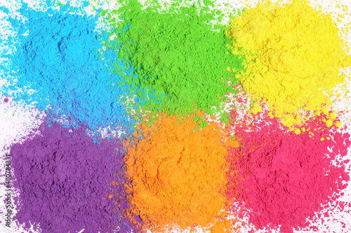 different colors of holi on a white background