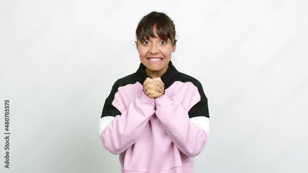 Pretty woman with surprise and shocked facial expression over isolated background