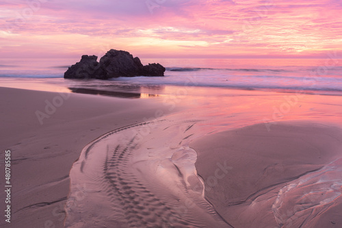 Sunset at low tide at Samoqueira beach photo