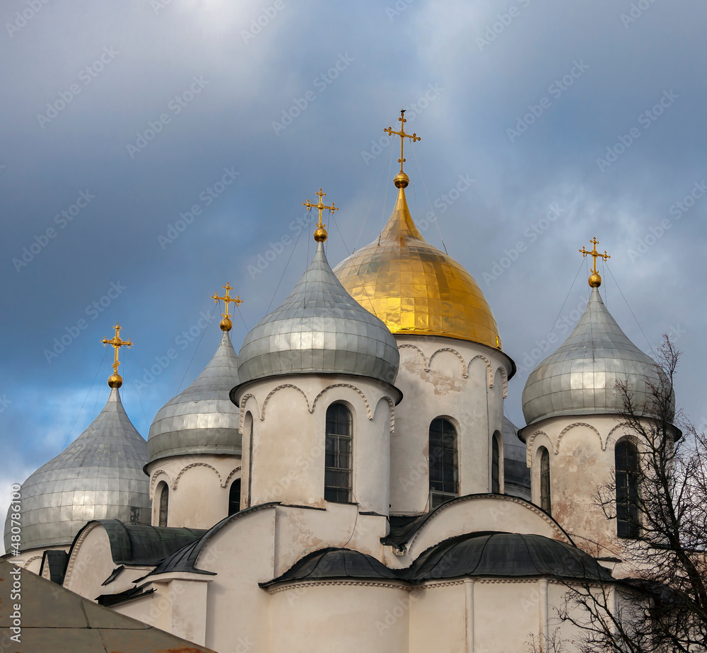 Domes of the ancient church of St. Sophia against the background of the autumn sky.