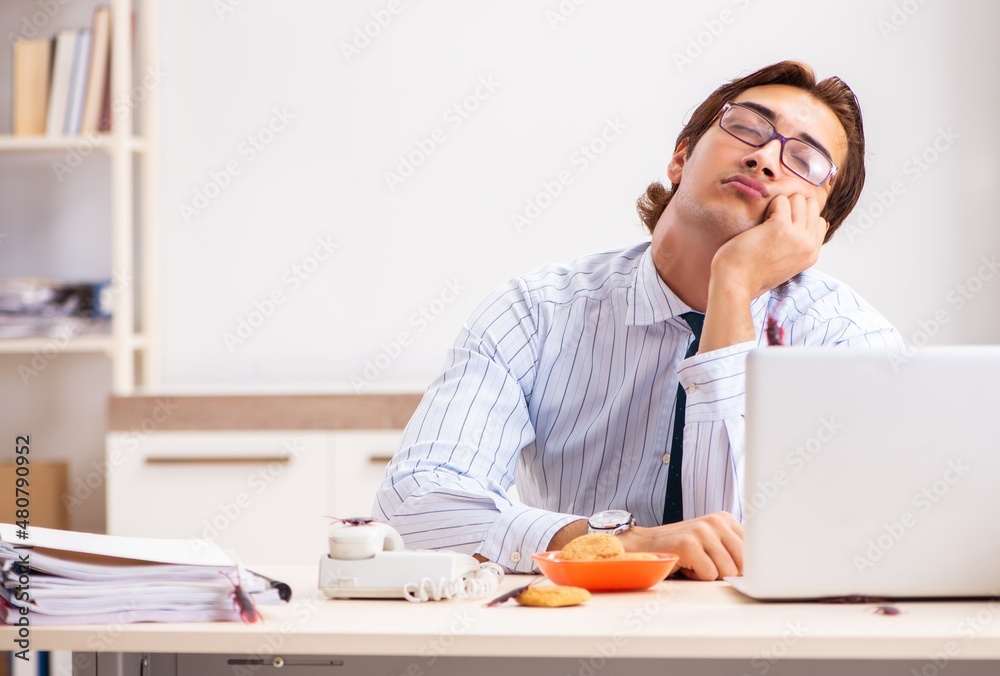 The employee eating food with cockroaches crawling around