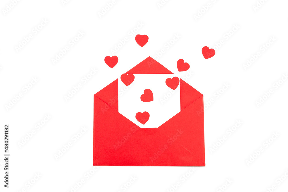 Red envelope with a white sheet of paper and red hearts on a white background. Valentine's day greeting card. Red envelope with a white sheet of paper and red hearts on a white background. Valentine's day greeting card.