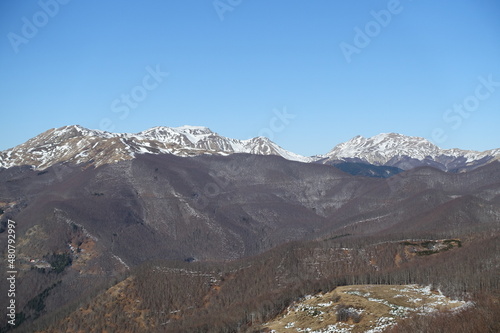parco regionale dell'alto frignano con vette del cimone innevate photo