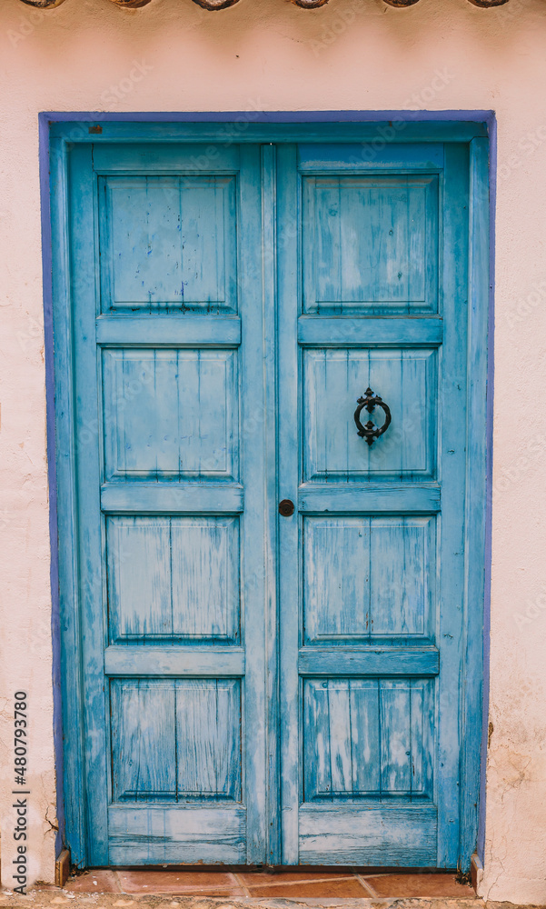 Typical blue door of Altea, the Mediterranean town that drives artists crazy