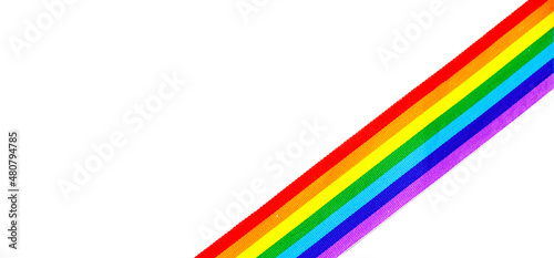 Colorful rainbow ribbon border design. LGBT colourful corner design, isolated on white background. Gay pride design. Ribbon or banner with flag of LGBTQ pride border
