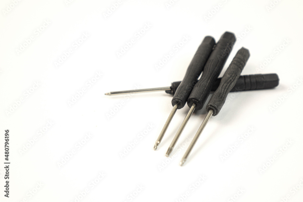 Screwdrivers on white background. Work tools Screwdrivers on white background. Work tools