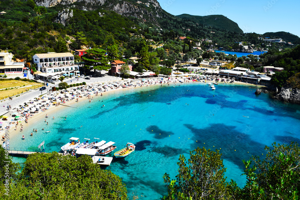 A picturesque beach in the village of Paleokastritsa. Selective focus. Corfu, Greece.