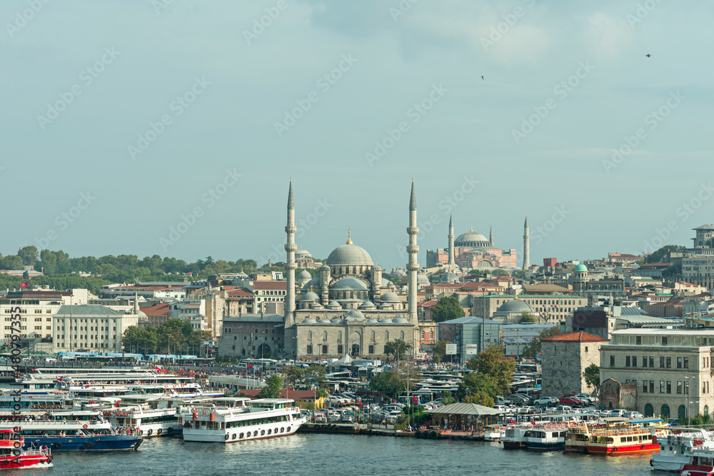 Fototapeta premium Golden horn port area in istanbul next to the new mosque and in the background the cathedral mosque of Santa Sofia