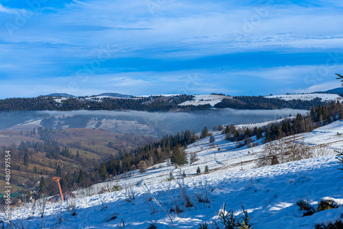 Mist over Nord-East slopes of Polonina Borzhava from Izky village, Carpathian mountains, Ukraine