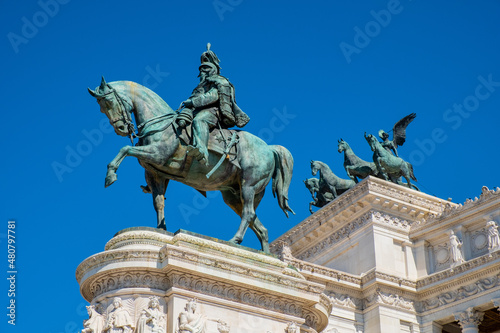 Statue of Victor Emmanuel II king of united Italy by Enrico Chiaradia within Altare della Patria monument at Piazza Venezia Square in historic city center of Rome in Italy photo