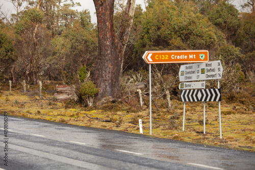 Road intersection with road signs at the turnoff to Cradle Mountain photo