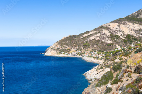 View over the houses and hills of Patresi on the coast of the island of Elba