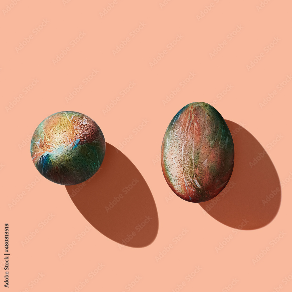 Pattern of easter eggs on orange pastel background Pattern of easter eggs on orange pastel background