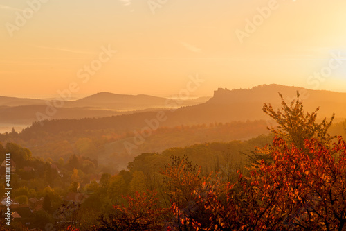Herbstlicher Sonnenaufgang in Heimburg mit Blick auf die Burg Regenstein photo