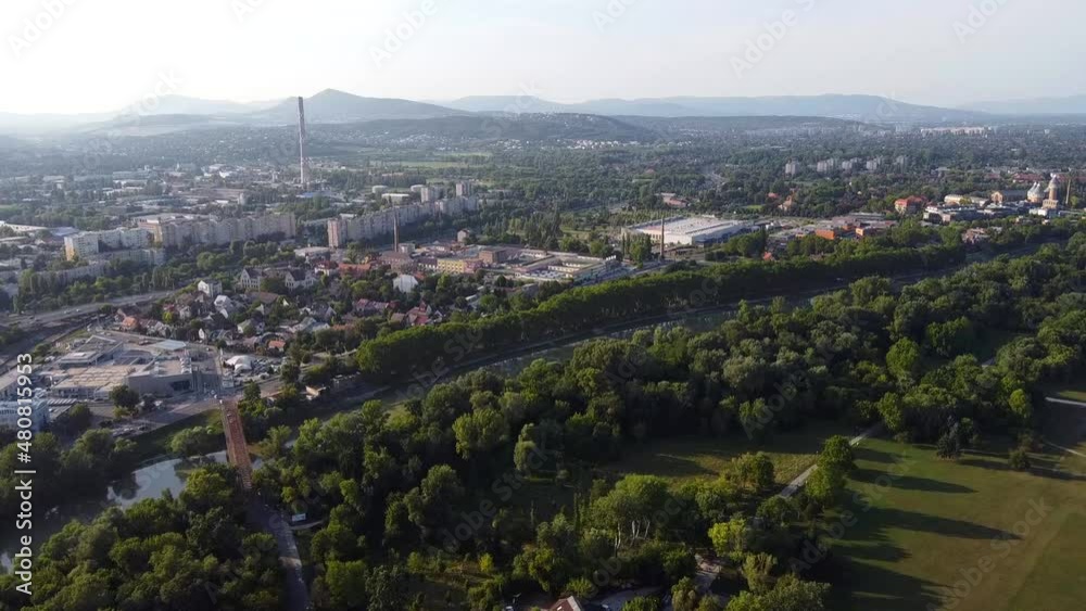 View of the Danube river. Park on the island of Hajógyári and houses on the shore in Budapest. Drone Video. Hungary. Europe View of the Danube river. Park on the island of Hajógyári and houses on the shore in Budapest. Drone Video. Hungary. Europe