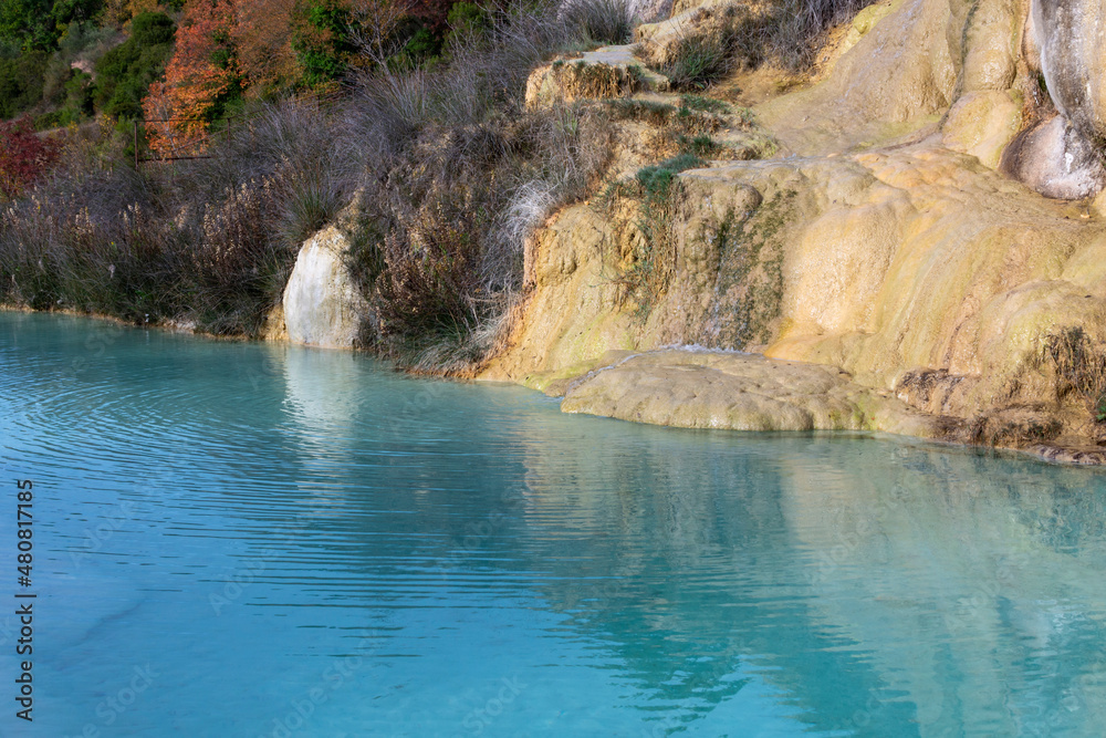Ancient hot thermal springs and blue pool in nature park Dei Mulini, Bagno Vignoni, Tuscany, Italy Ancient hot thermal springs and blue pool in nature park Dei Mulini, Bagno Vignoni, Tuscany, Italy