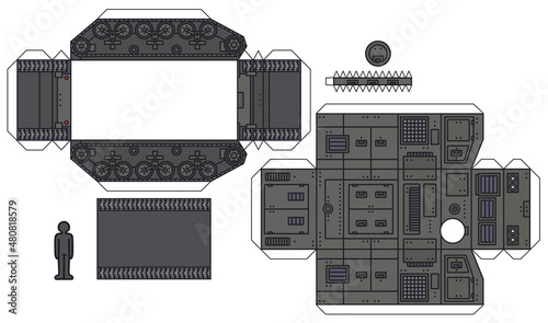 The paper model of an old khaki green military armoured tracked carrier