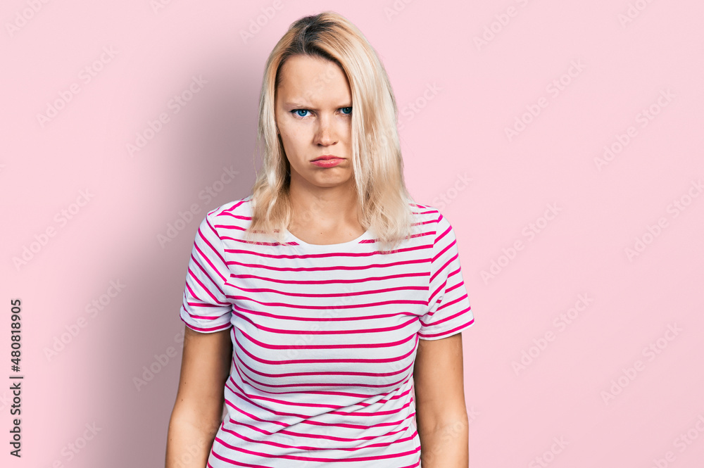 Young caucasian woman wearing casual clothes depressed and worry for distress, crying angry and afraid. sad expression. Young caucasian woman wearing casual clothes depressed and worry for distress, crying angry and afraid. sad expression.
