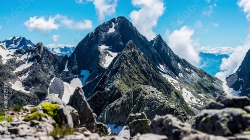 Beautiful mountain peak with clouds and fog 4K time lapse footage