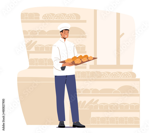Bakery Industry, Pastry and Baked Food Production and Manufacture. Man Chef Baker in Sterile Uniform and Hat Hold Tray