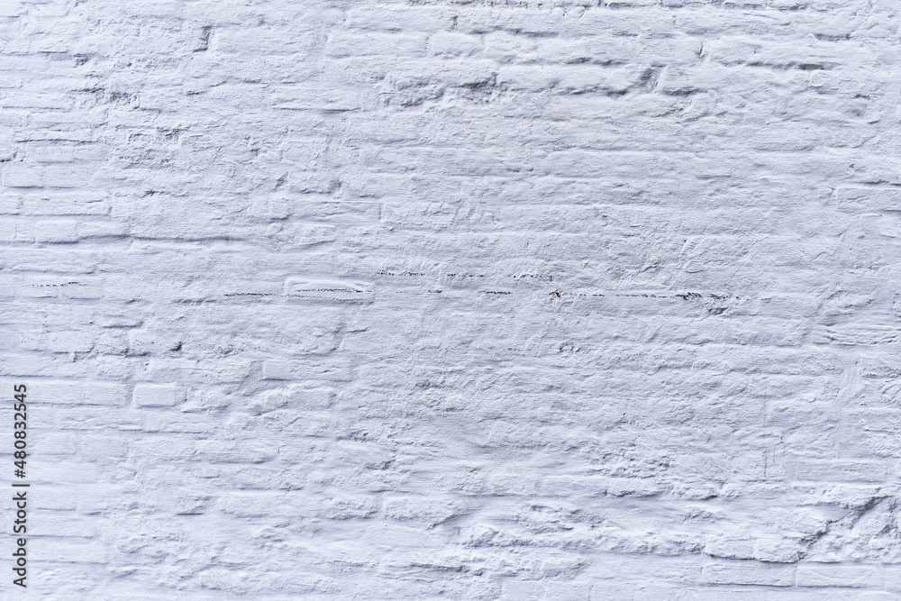 Painted white brick wall surface background Painted white brick wall surface background