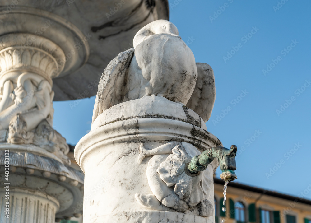 Detail of the fountain of the Young Fisherman (Fontana del Pescatorello), sculpted in the 19th century, in Duomo square, Prato city, Tuscany region, Italy