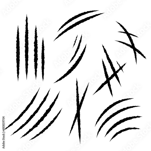 Cat scratches set. Animal claws marks collection in black. Monster or dinosaur attack slash stripes on white background. Vector illustration