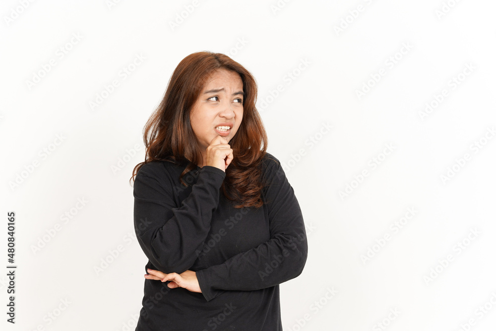 Thinking Gesture Of Beautiful Asian Woman Wearing Black Shirt Isolated On White Background Thinking Gesture Of Beautiful Asian Woman Wearing Black Shirt Isolated On White Background