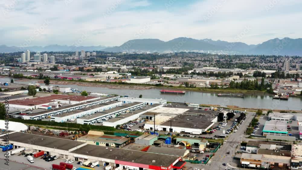 Aerial View Of Richmond City Industrial Area On The Bank Of Fraser River In British Columbia, Canada. Aerial View Of Richmond City Industrial Area On The Bank Of Fraser River In British Columbia, Canada.