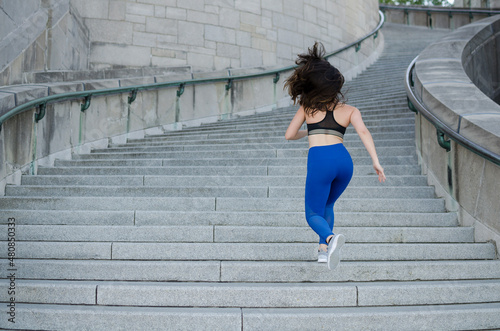 woman running on stairs