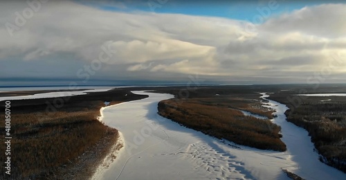 view of the river in winter from above