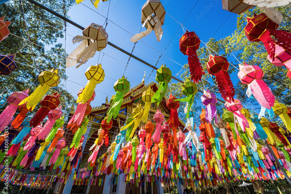 Fototapeta premium Nakhon Nayok, Thailand - January, 01, 2022 : Colorful hanging lanterns lighting In the Chulaphon Temple in Nakhon Nayok, Thailand