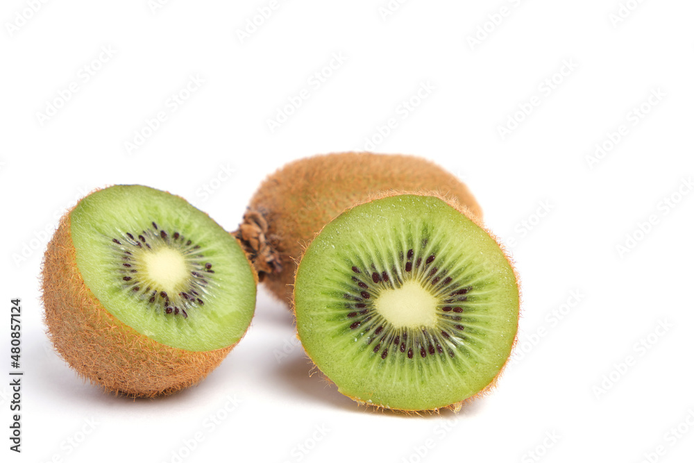 Cut kiwi on a white background, isolate.Delicious and healthy fruits. Cut kiwi on a white background, isolate.Delicious and healthy fruits.