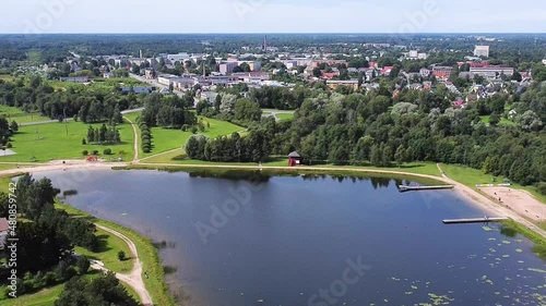 Aerial drone clip of Paide artificial lake and the town in the summertime photo