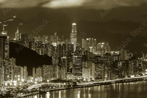 Night scenery of Victoria Harbor of Hong Kong city © leeyiutung