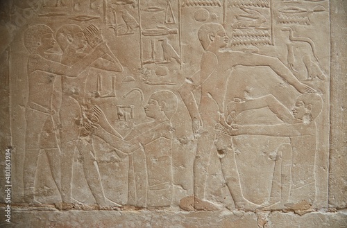 The famous circumcision scene from the Tomb of Ankhmahor photo