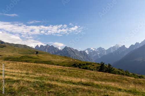 Amazing view from the Tskahazagari peak on the sharp Svaneti mountain peaks near Mestia in the Greater Caucasus Mountain Range, Upper Svaneti, Country of Georgia.Hiking trail to the Koruldi Lakes.
