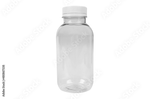 Empty transparent plastic bottle with lid for dairy products and juices isolated on white background. Packaging products. Plastic bottle isolated with clipping path