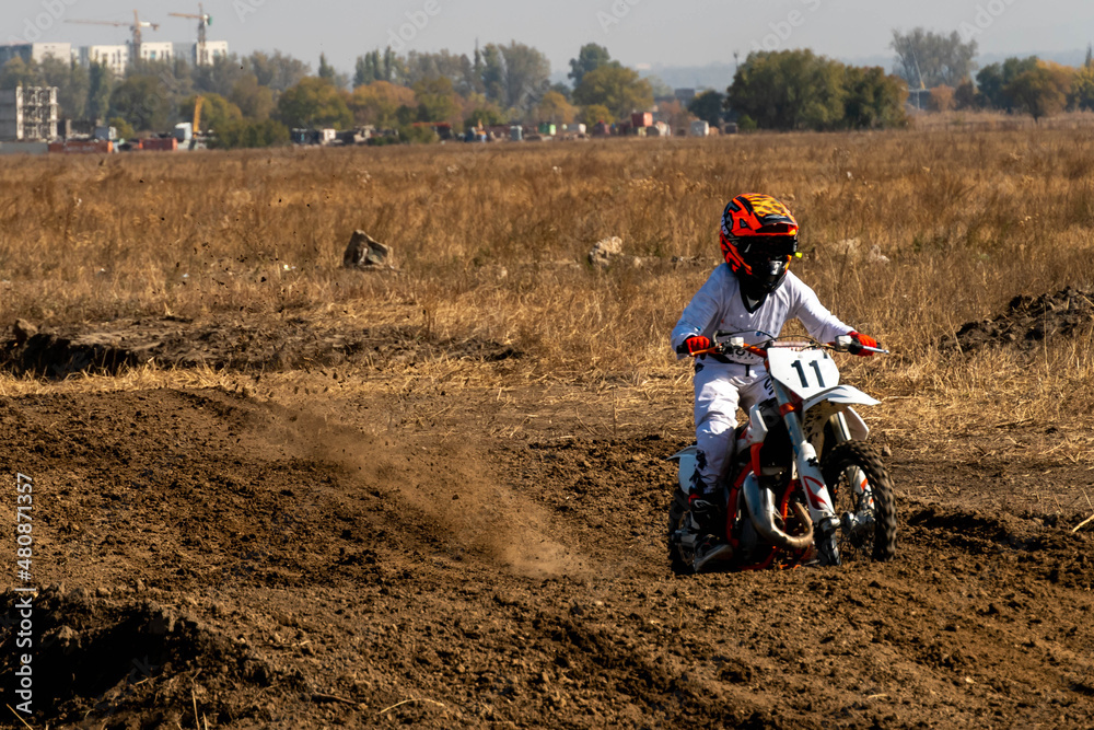 jumping on a motorcycle. motocross. motorcycle racing. bikers on the track jumping on a motorcycle. motocross. motorcycle racing. bikers on the track