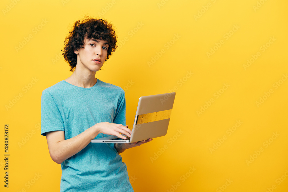 curly guy with laptop work online finance isolated backgrounds