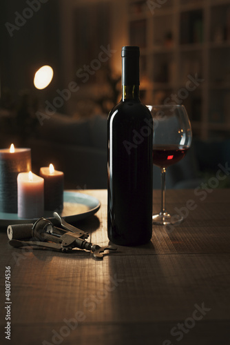 Excellent red wine tasting at night © stokkete
