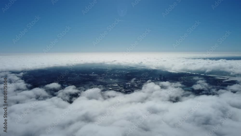 Sun is rising above the endless sea of clouds until the horizon. Amazing nature landscape, 4K drone in sky Sun is rising above the endless sea of clouds until the horizon. Amazing nature landscape, 4K drone in sky