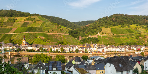 Zell an der Mosel town at Moselle river with vineyards wine panorama in Germany photo