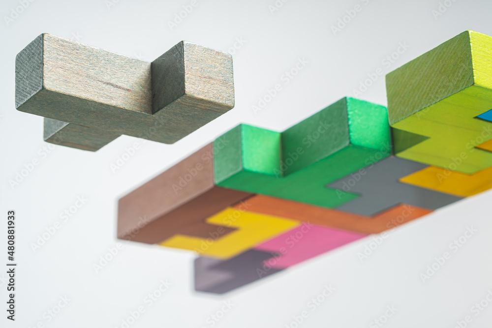 Abstract construction from wooden blocks. The concept of logical thinking.. Abstract construction from wooden blocks. The concept of logical thinking..