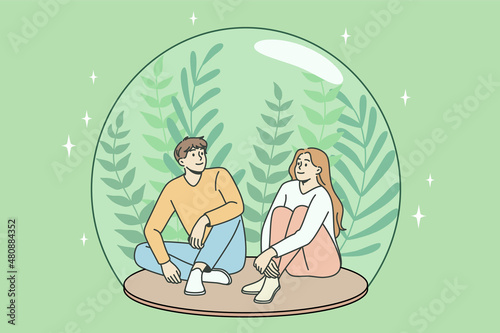 Fresh air and ecological conversation concept. Young smiling couple sitting in transparent glass ball with fresh plants inside looking at each other vector illustration 