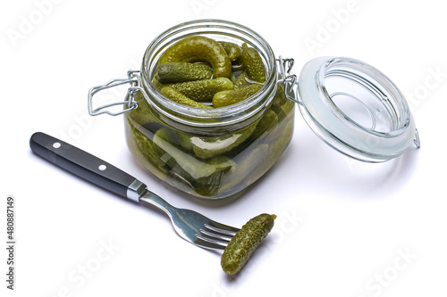 Can of Tasty green cornichons isolated on a white background