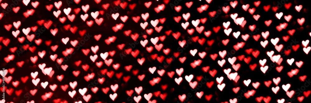 Valentine's day red hearts bokeh heart shape love romance isolated on black background, copy space, 14th February holyday, birthday, anniversary or wedding backdrop, greeting card, invitation, banner Valentine's day red hearts bokeh heart shape love romance isolated on black background, copy space, 14th February holyday, birthday, anniversary or wedding backdrop, greeting card, invitation, banner